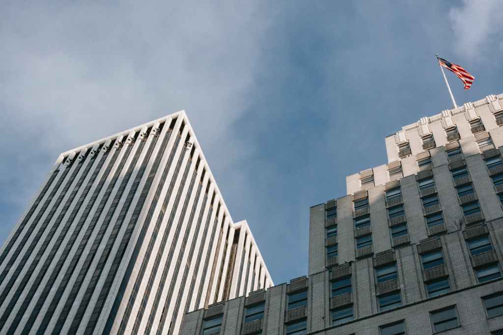 waving flag of top of high tower